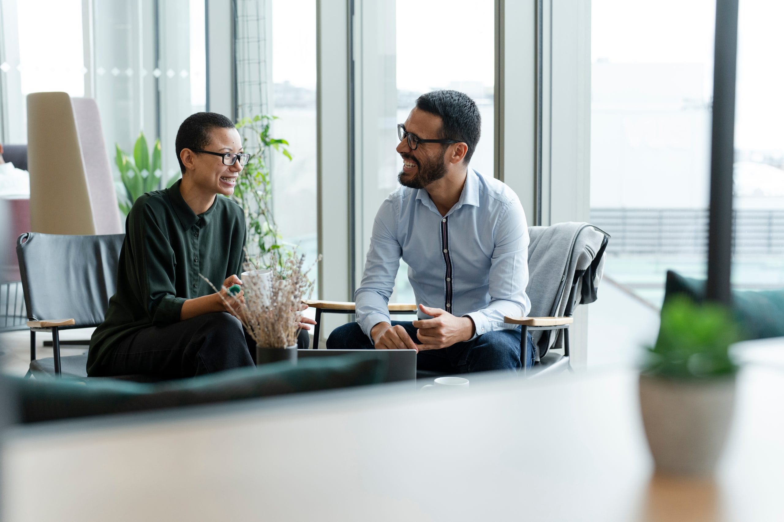 Two business people speaking